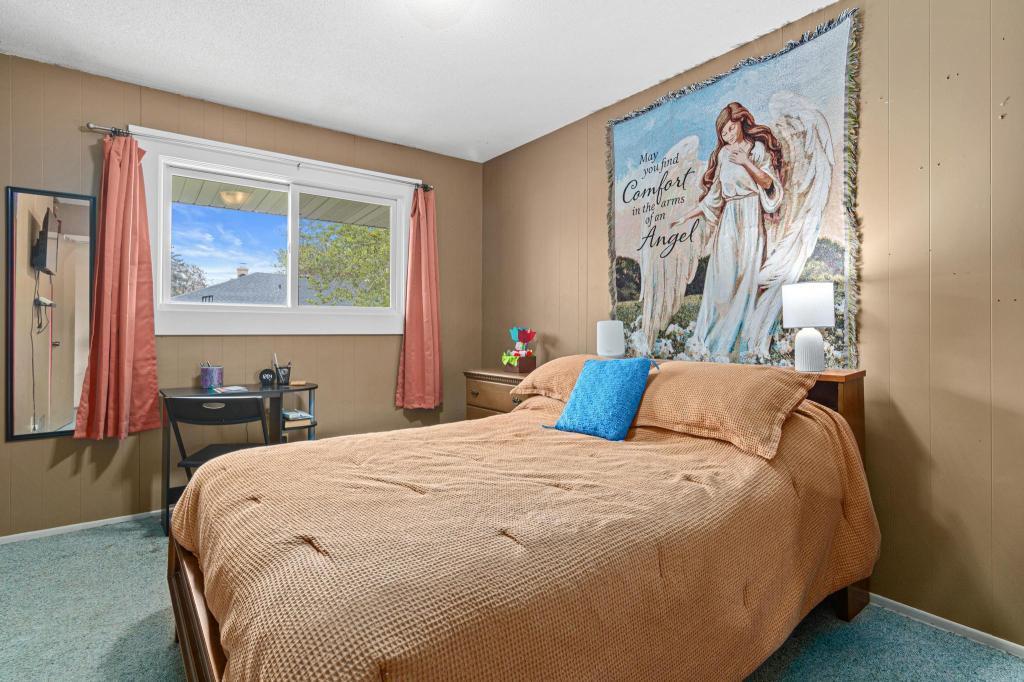 Each unit features two main level bedrooms with comfortable layouts and natural light. Hardwood floors under the carpet throughout the main floor.