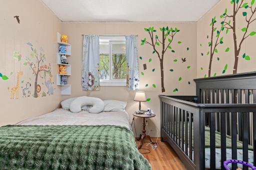 Another view of the second bedroom - overlooking the backyard. Great hardwood floors and newer windows.