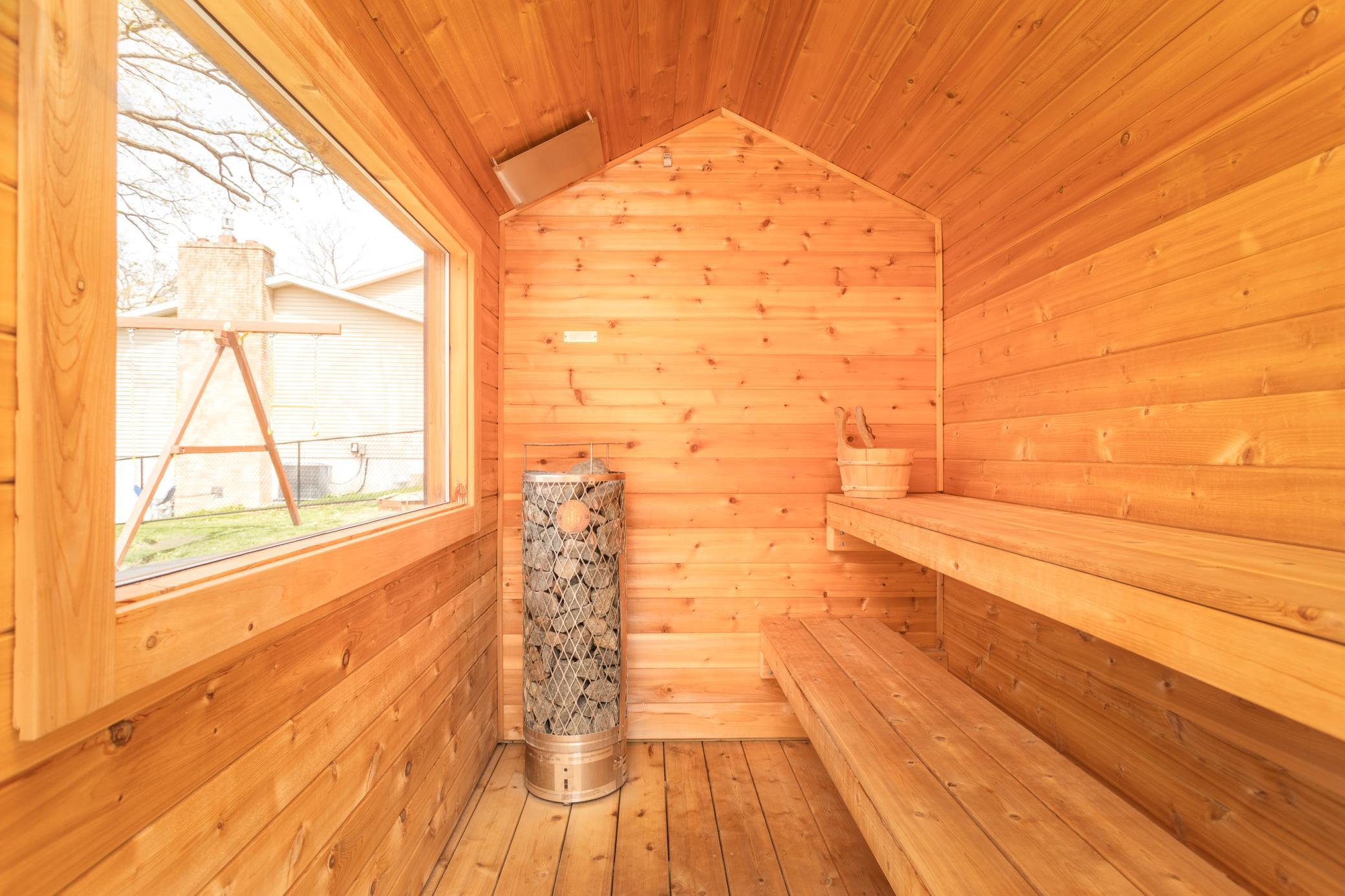 Private outdoor sauna, perfect for relaxation and enjoying the lake views.