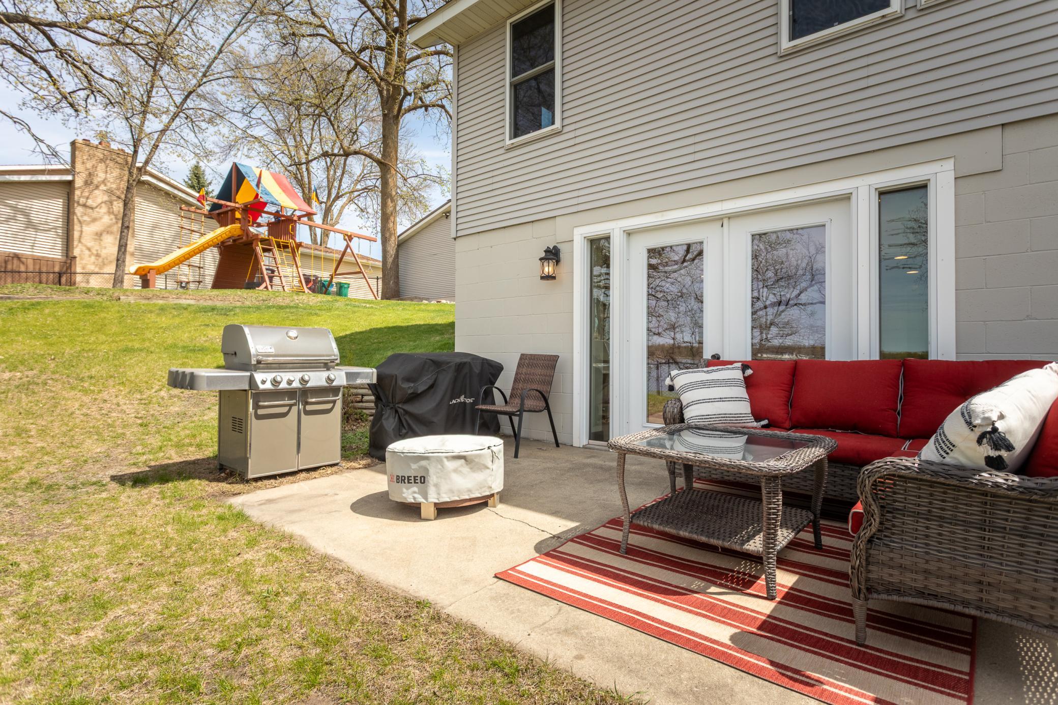 Rear of the house, highlighting the backyard and outdoor amenities.