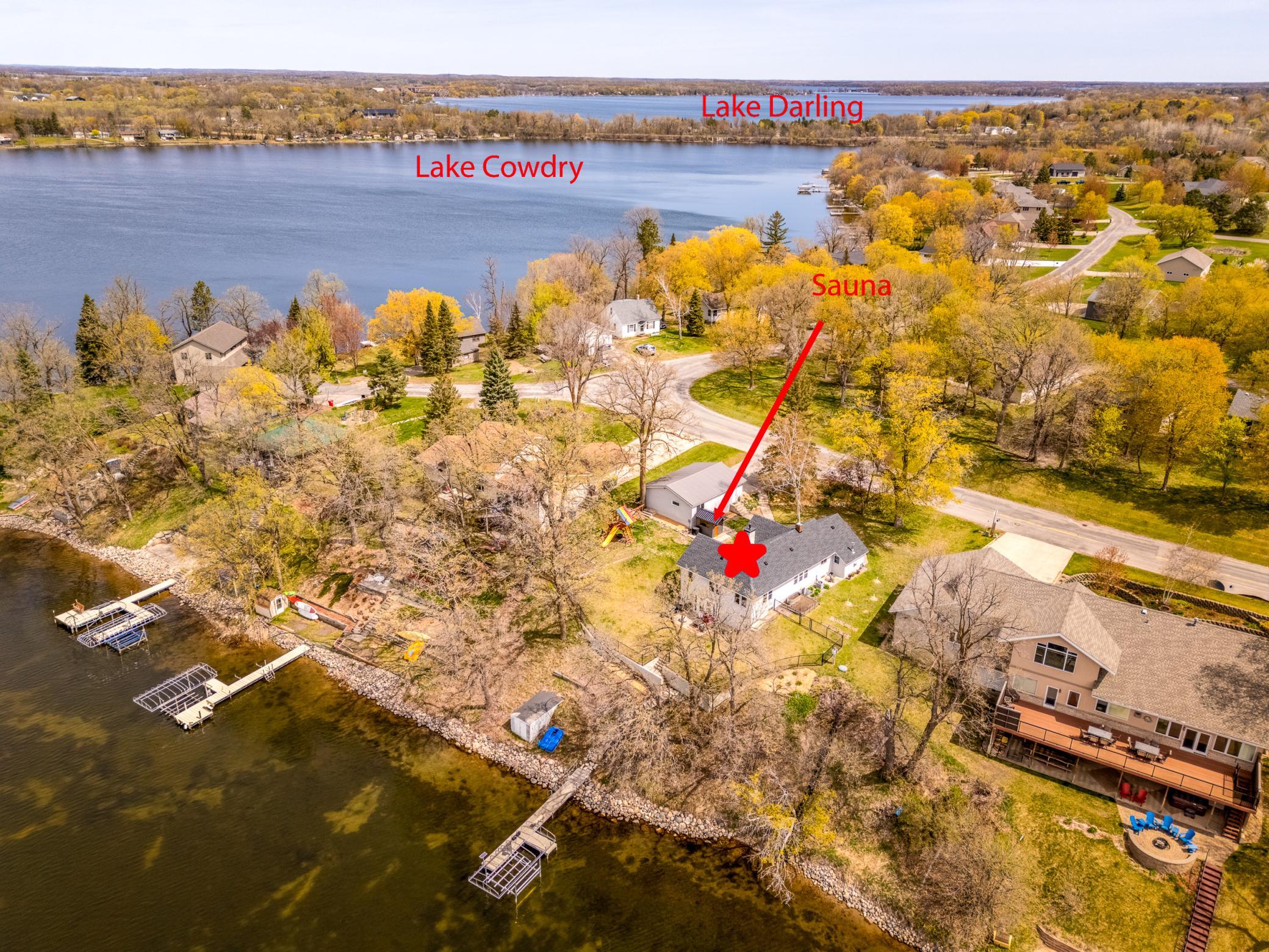 Aerial view highlighting the home’s location to Lake Darling.