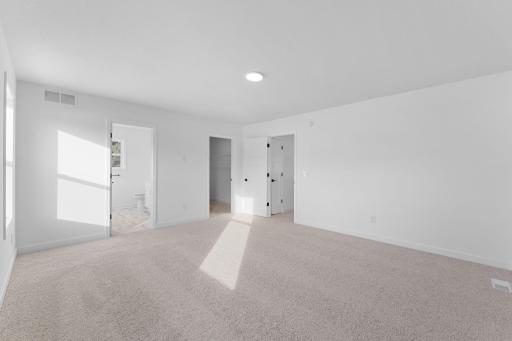 (Photo of a similar home, actual finishes may vary) The ownerâs suite bedroom is a restful and luxurious space