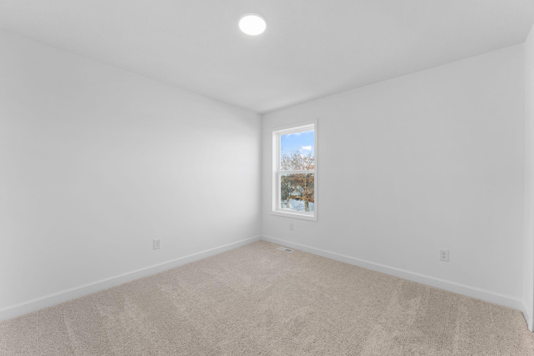 (Photo of a similar home, actual finishes may vary) With four bedrooms in total, this home is great for households that need space.