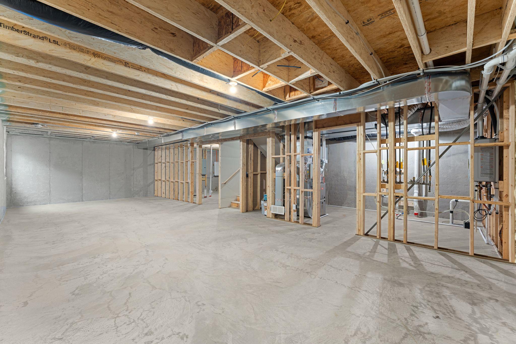 (Photo of a similar home, actual finishes may vary) The unfinished basement provides so much potential for customization.