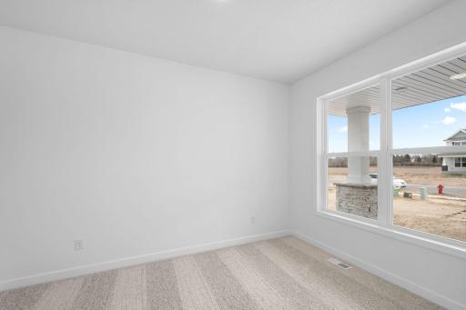 (Photo of a similar home, actual finishes may vary) The first-floor flex space can easily operate as a formal dining room, sitting room or home office.