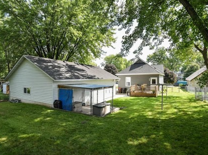 Private Fenced back yard with big shad trees. Perfect for letting your puppys out to play