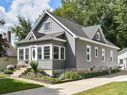 Cozy front porch entry and large driveway