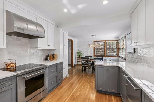 Note the one of a kind range hood, all of the counter space and custom cabinetry. This is truly a chefs kitchen!
