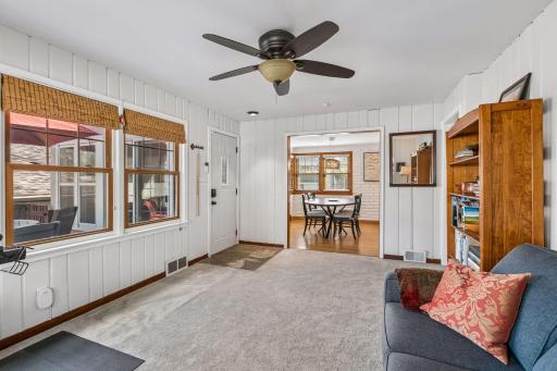 The main floor family room overlooks the backyard, and leads into the dining room and the sunroom.