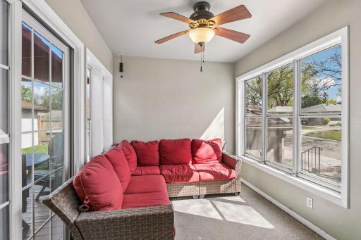 The sunroom is located right off of the family room and is the perfect spot to watch the world go by.