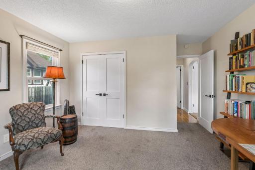 This room is generously sized and has great closet space. Note the newer interior doors.