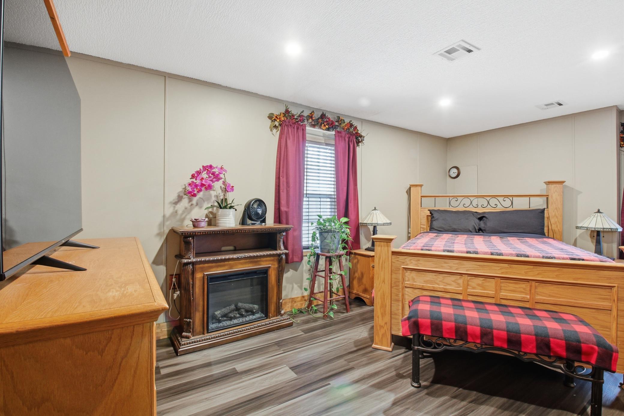 “Spacious bedroom with room to stretch out and make it your own comfortable retreat.”
