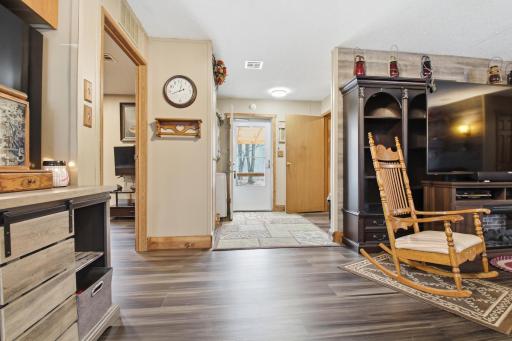 View toward the homeâs main entry, conveniently located just off the living area.
