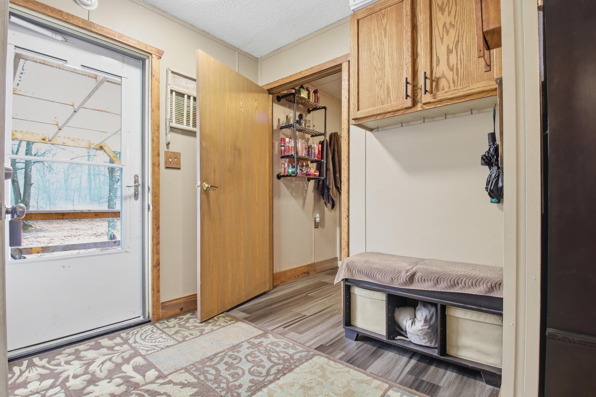 Welcoming main entry with convenient storage for coats and shoes.