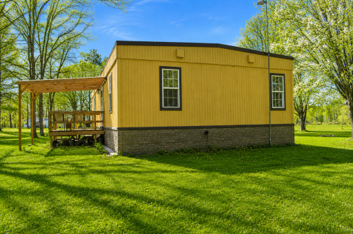 Set among mature trees, the property offers a sense of privacy while still providing open yard space to enjoy