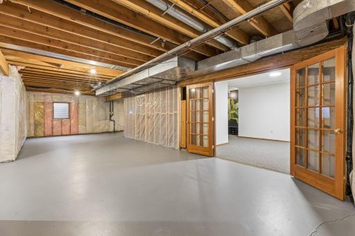 Unfinished portion of the basement - ready for your vision!