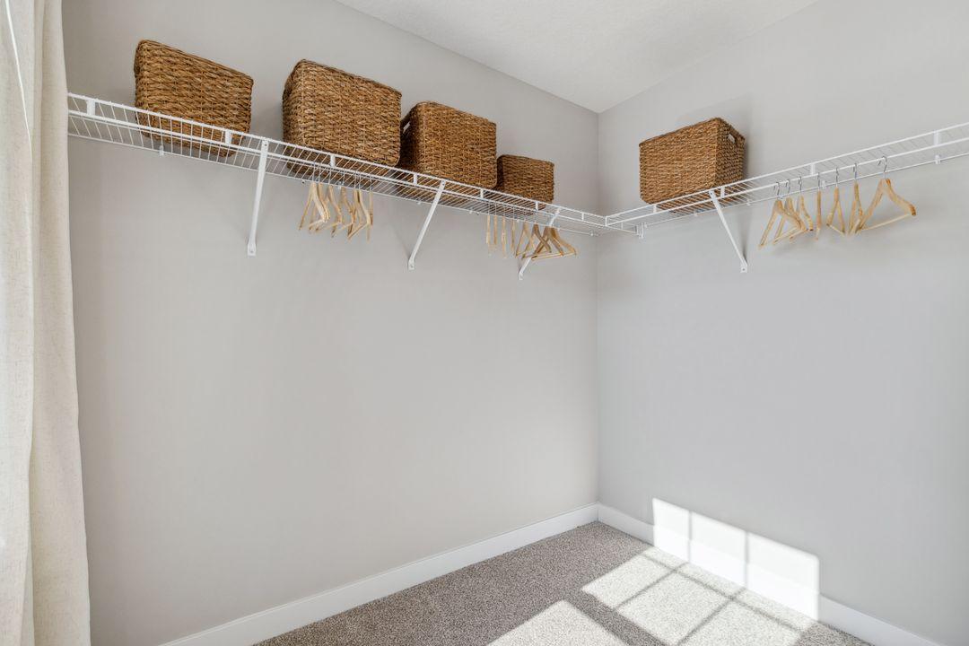 Each of the home's three secondary upper-level bedrooms are spacious, and each have immediate access to their own bath - two of which share a Jack and Jill! Photo of a model home, color & options will vary.