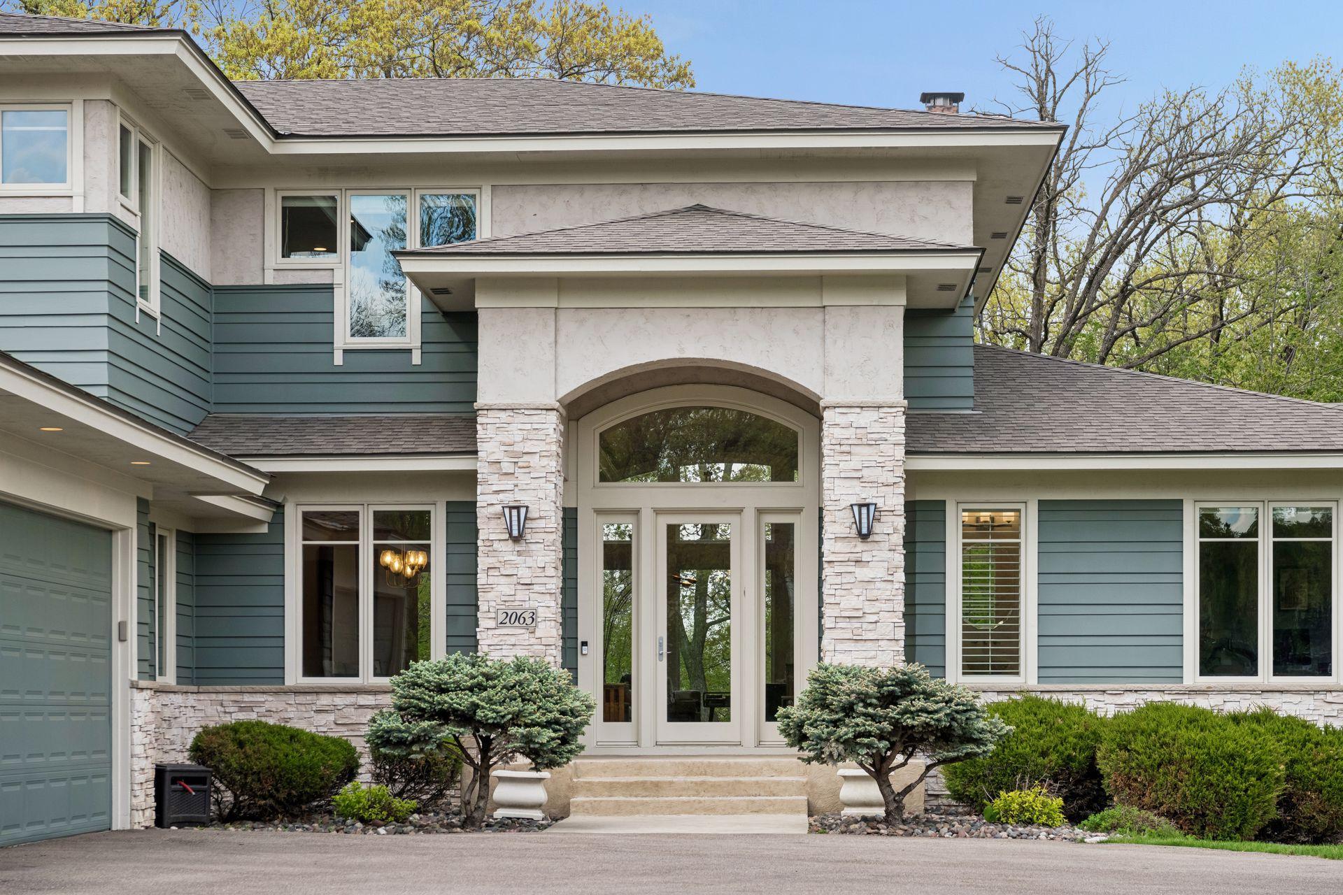 Loads of curb appeal with all new exterior paint (2025), new roof (2019), new driveway (2022) and extensive landscaping in the last five years.