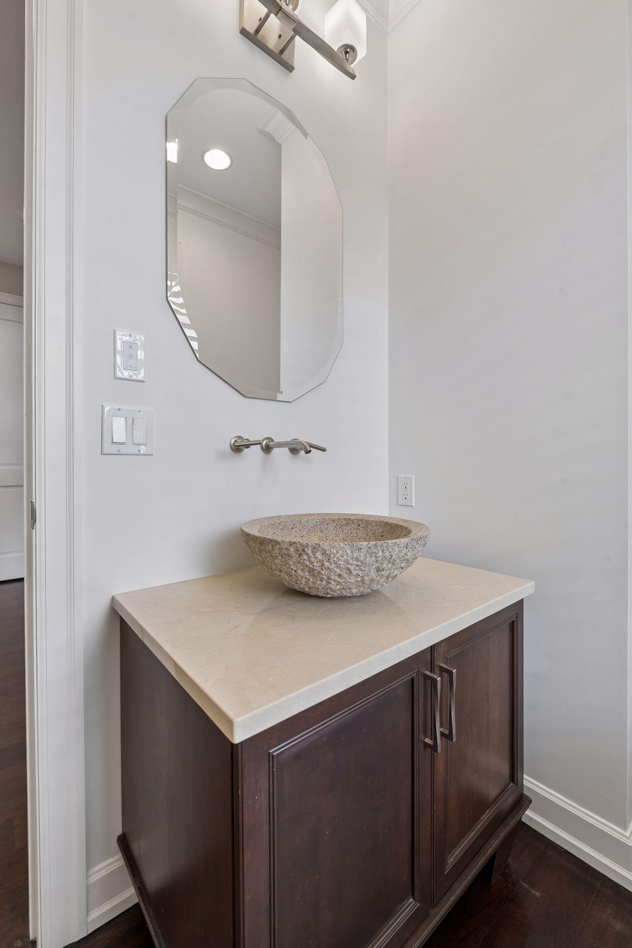 A perfect powder bath (one of three bathrooms on the main floor) was recently renovated.
