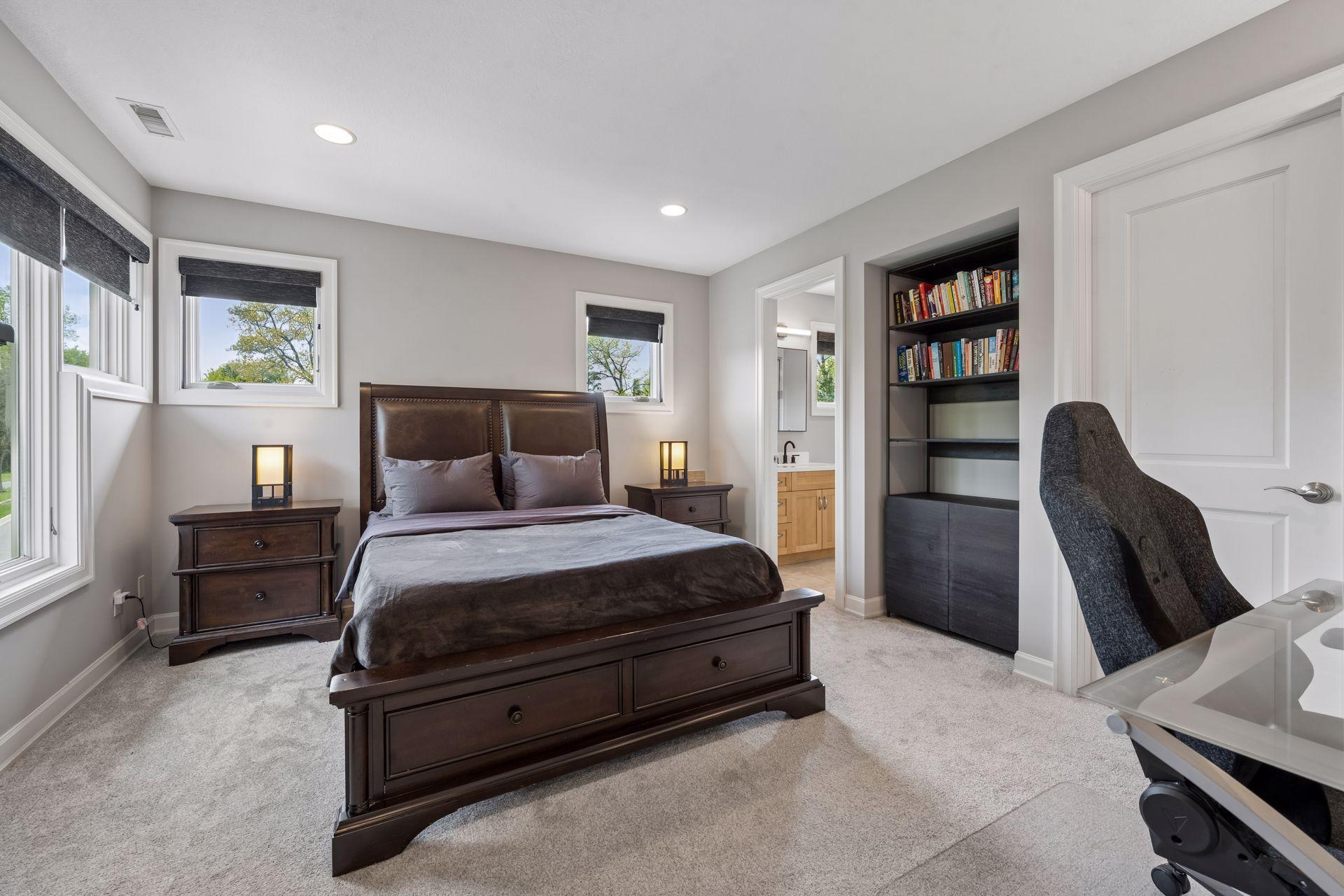 The upper level boasts 3 enormous bedrooms, this one with an en suite bathroom (so it could be used as a 2nd primary suite, if an upper level primary was desired).