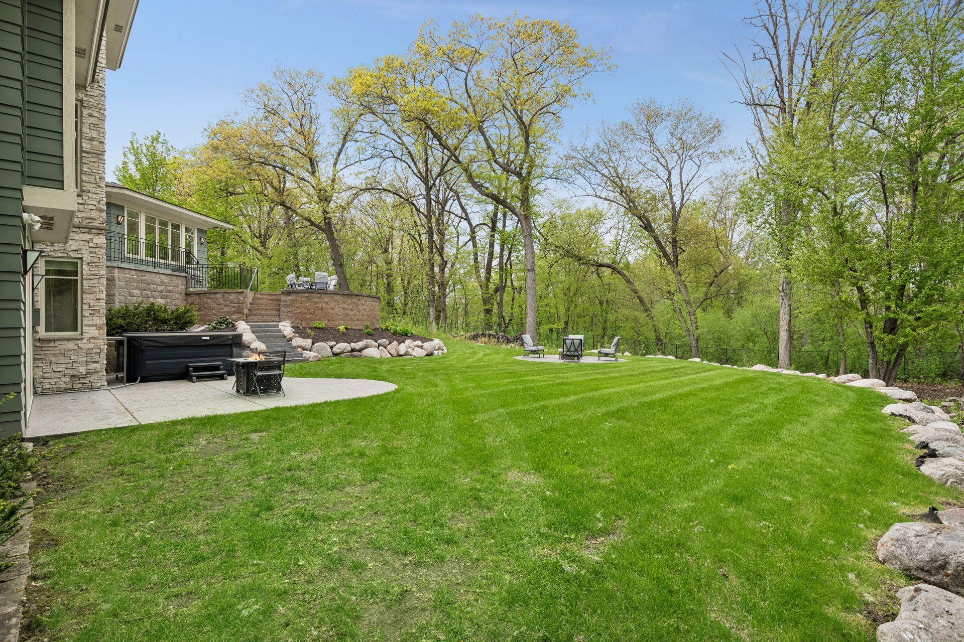 Truly spectacular yard (fully fenced in the back).