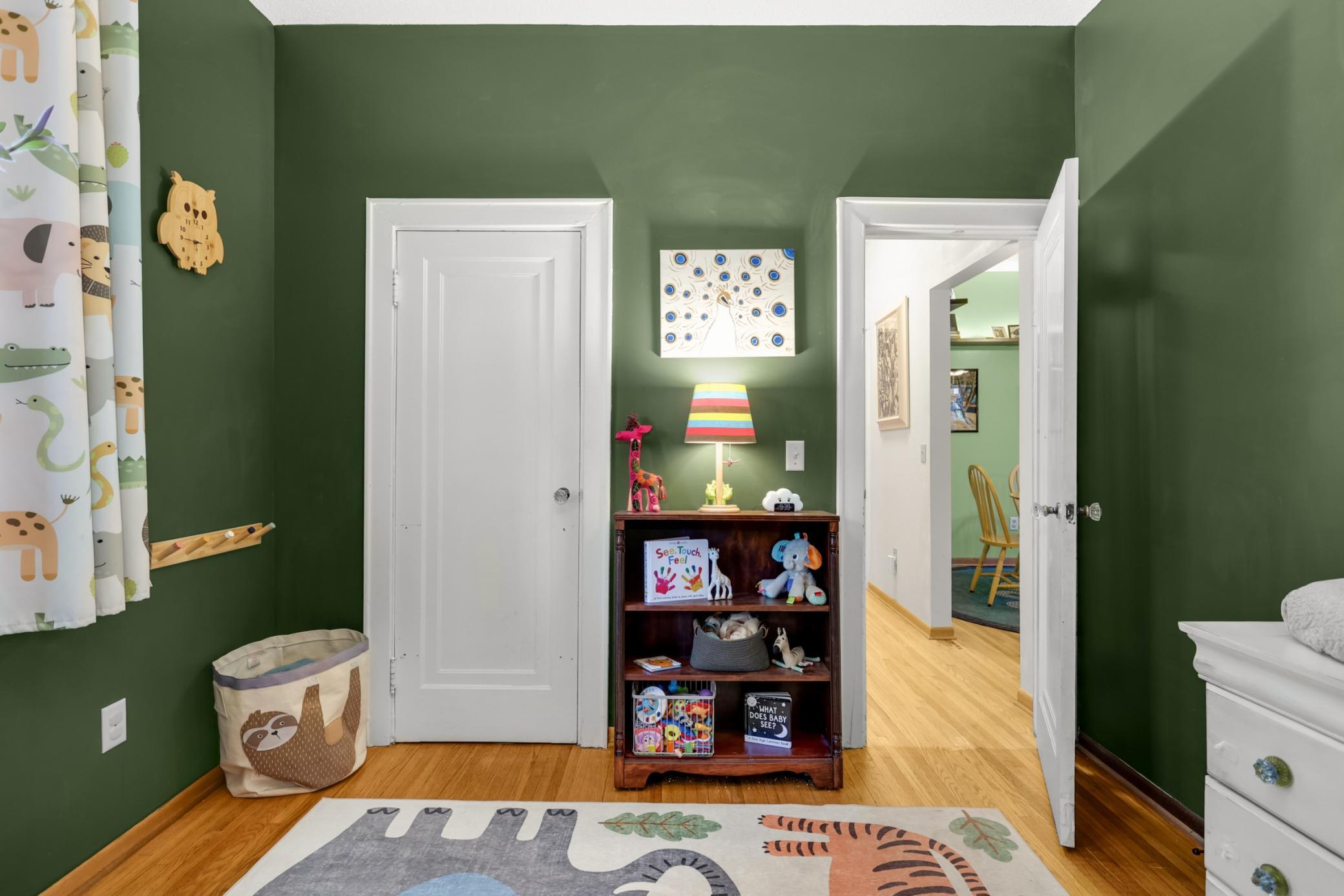 Second bedroom located on the main level, offering convenient single-level living and versatile space for guests.