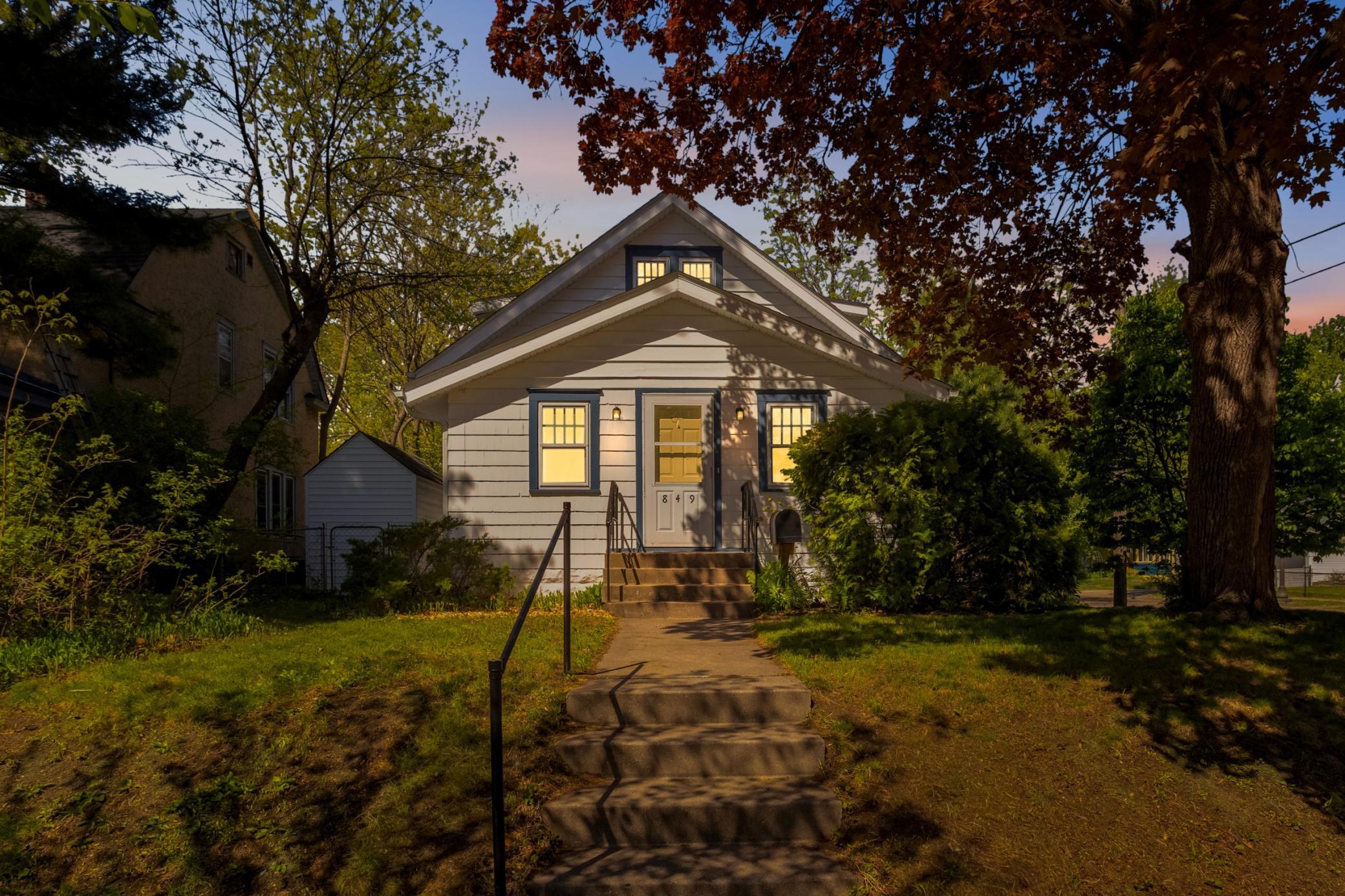 Welcoming front exterior with charming curb appeal, offering a warm first impression in a highly convenient Saint Paul location.