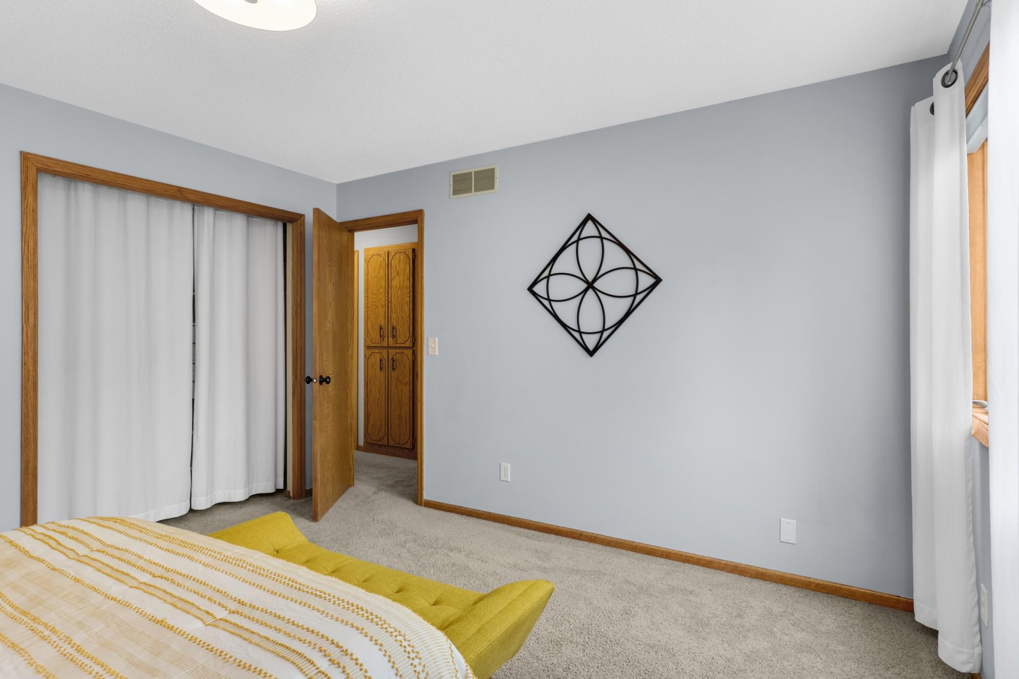 Comfortable primary bedroom offering a peaceful retreat at the end of the day.