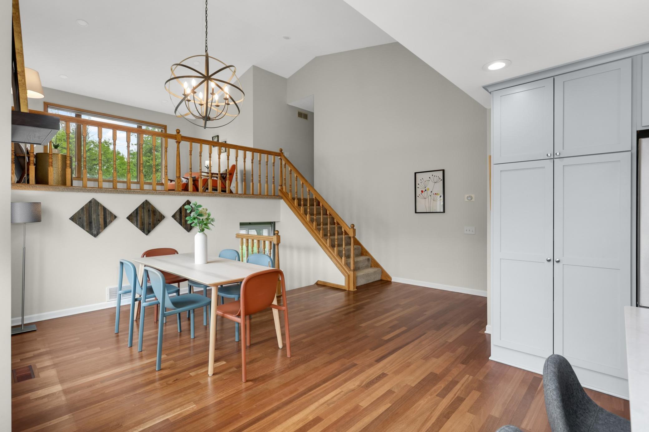 Rich hardwood floors create a warm and inviting atmosphere while complementing the home’s updated finishes.