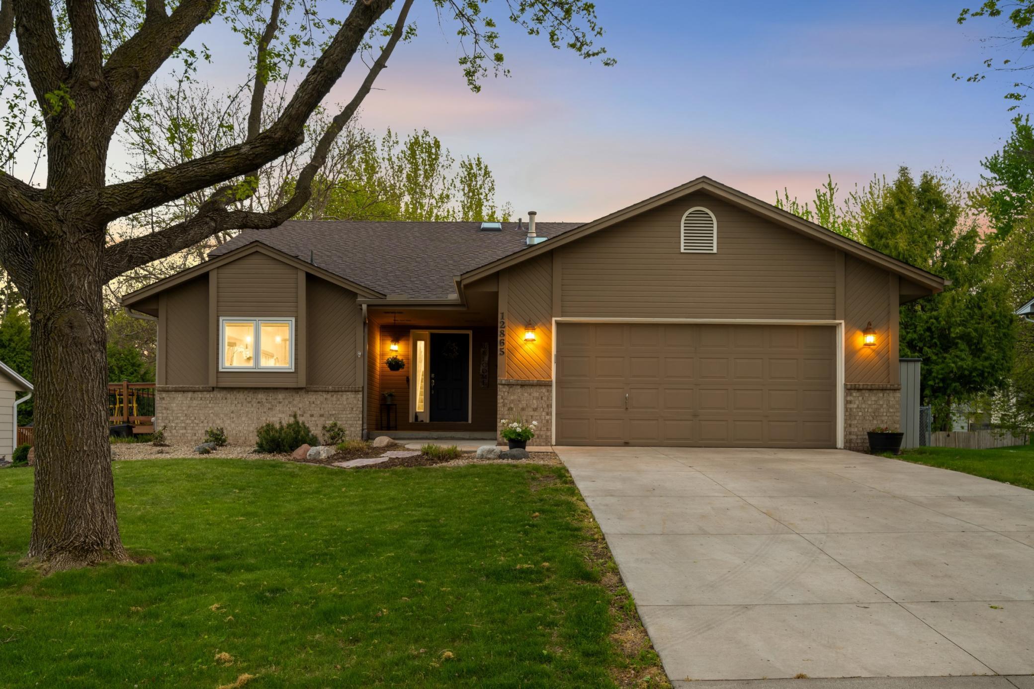 Beautiful curb appeal and a well-maintained exterior located in a highly desirable Maple Grove neighborhood.