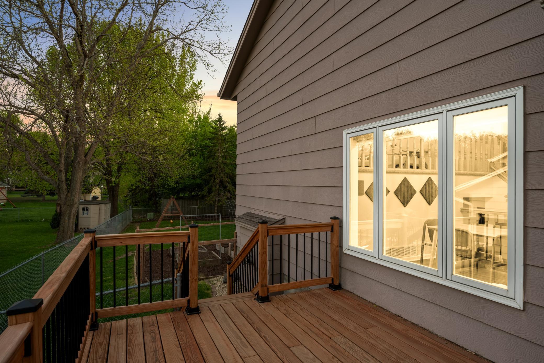 Newly renovated deck conveniently located off the kitchen and dining area, creating the perfect extension of the home for grilling, entertaining, and relaxing outdoors.