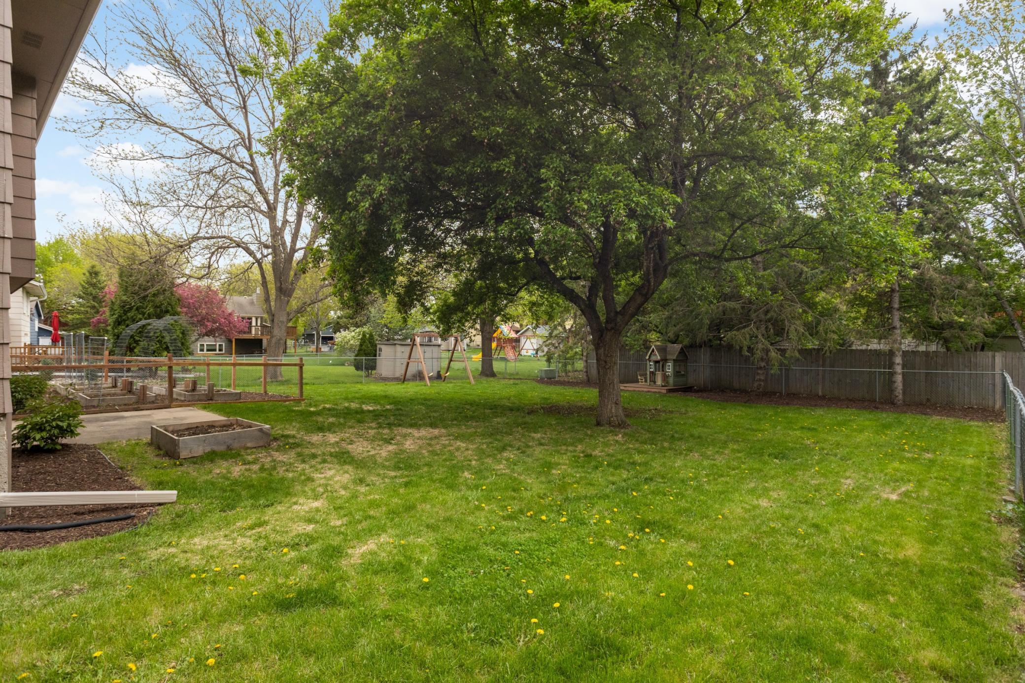 Private backyard with plenty of room for grilling, outdoor gatherings, and enjoying Minnesota summers.