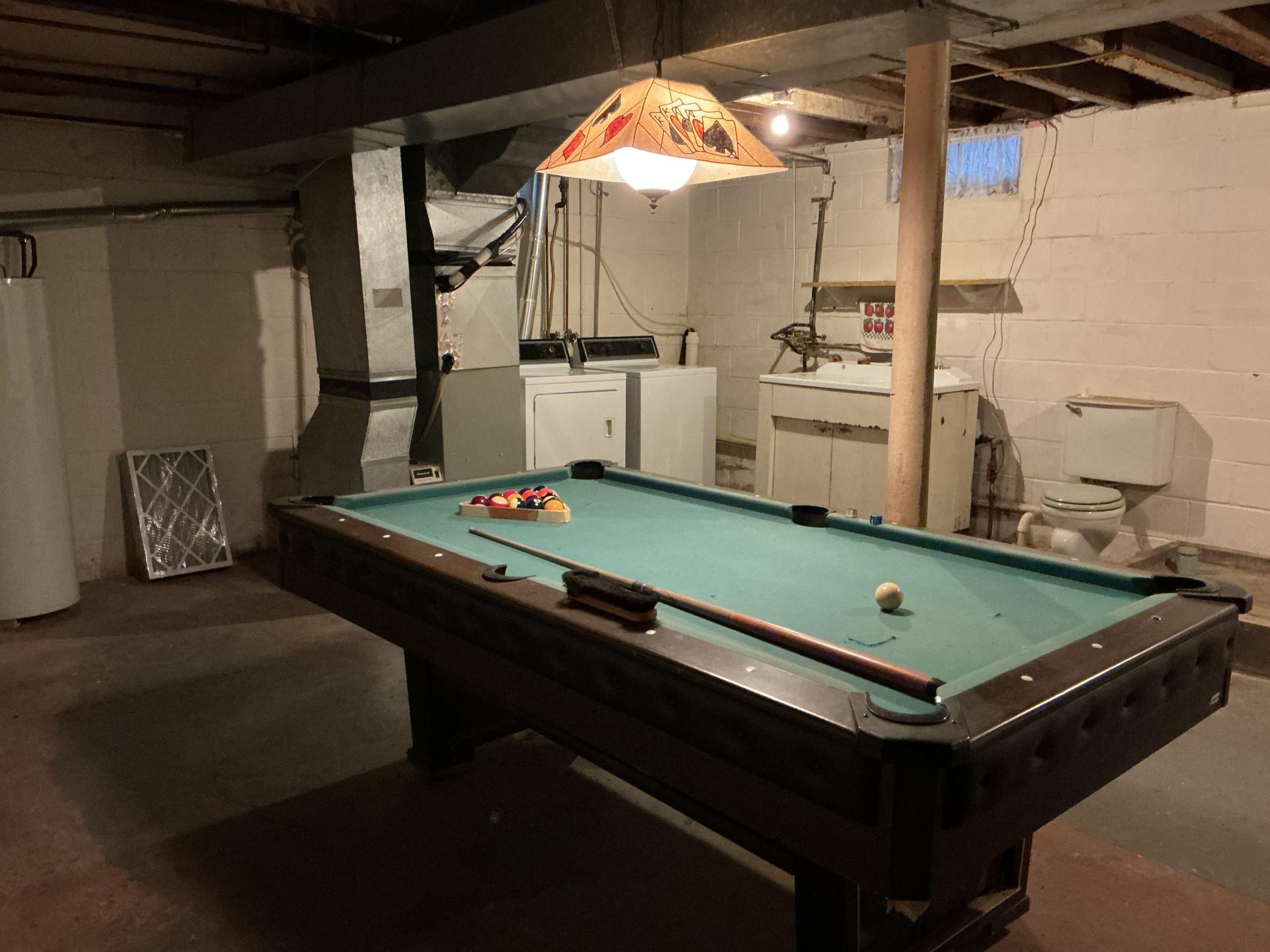 View of billiard area to the laundry
