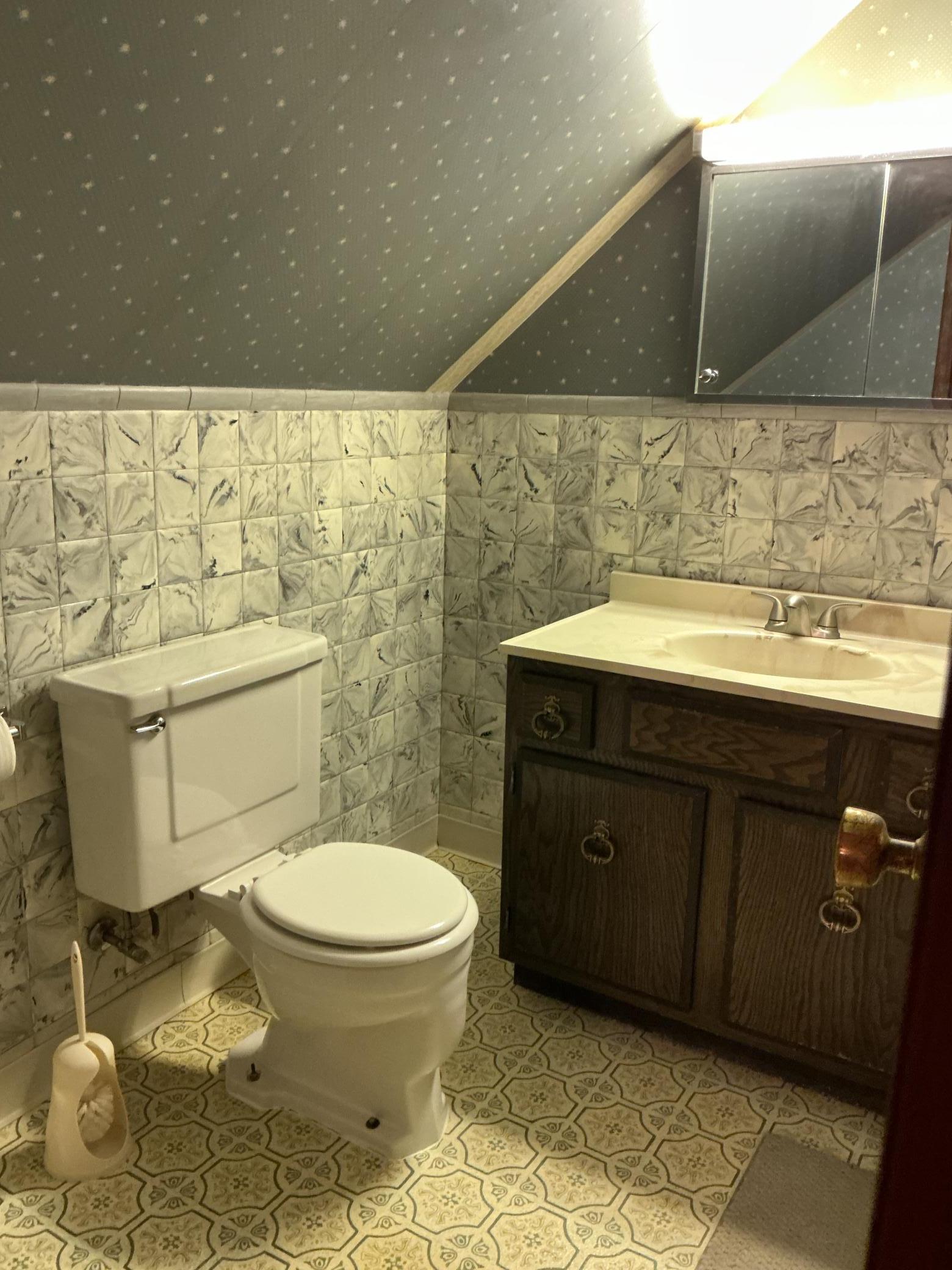 Upstairs bathroom with tub