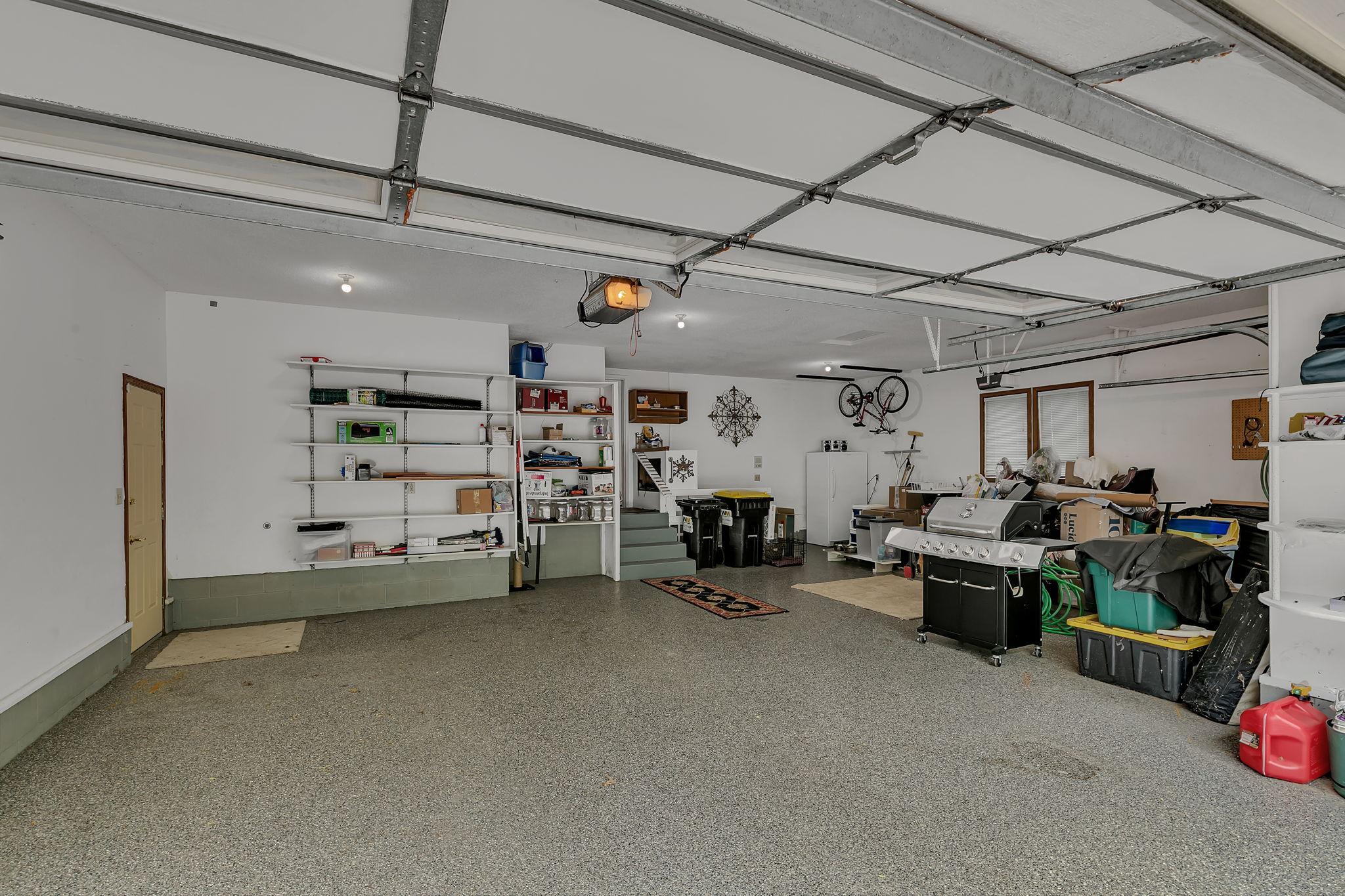 epoxy floor in the three stall attached garage