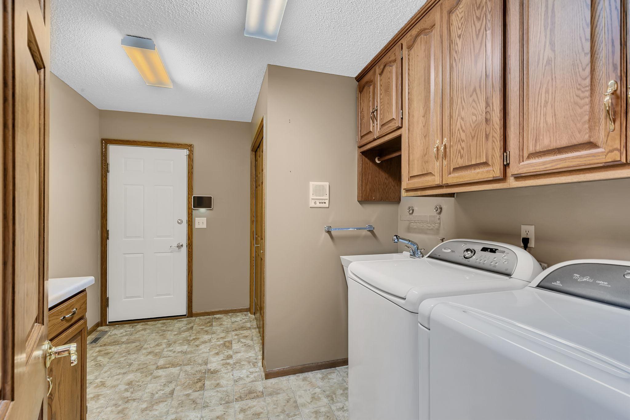 main floor laundry with exit to garage