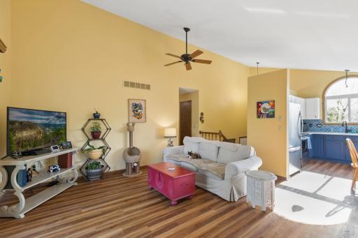 The main level offers an open concept through the kitchen/dining/living area.