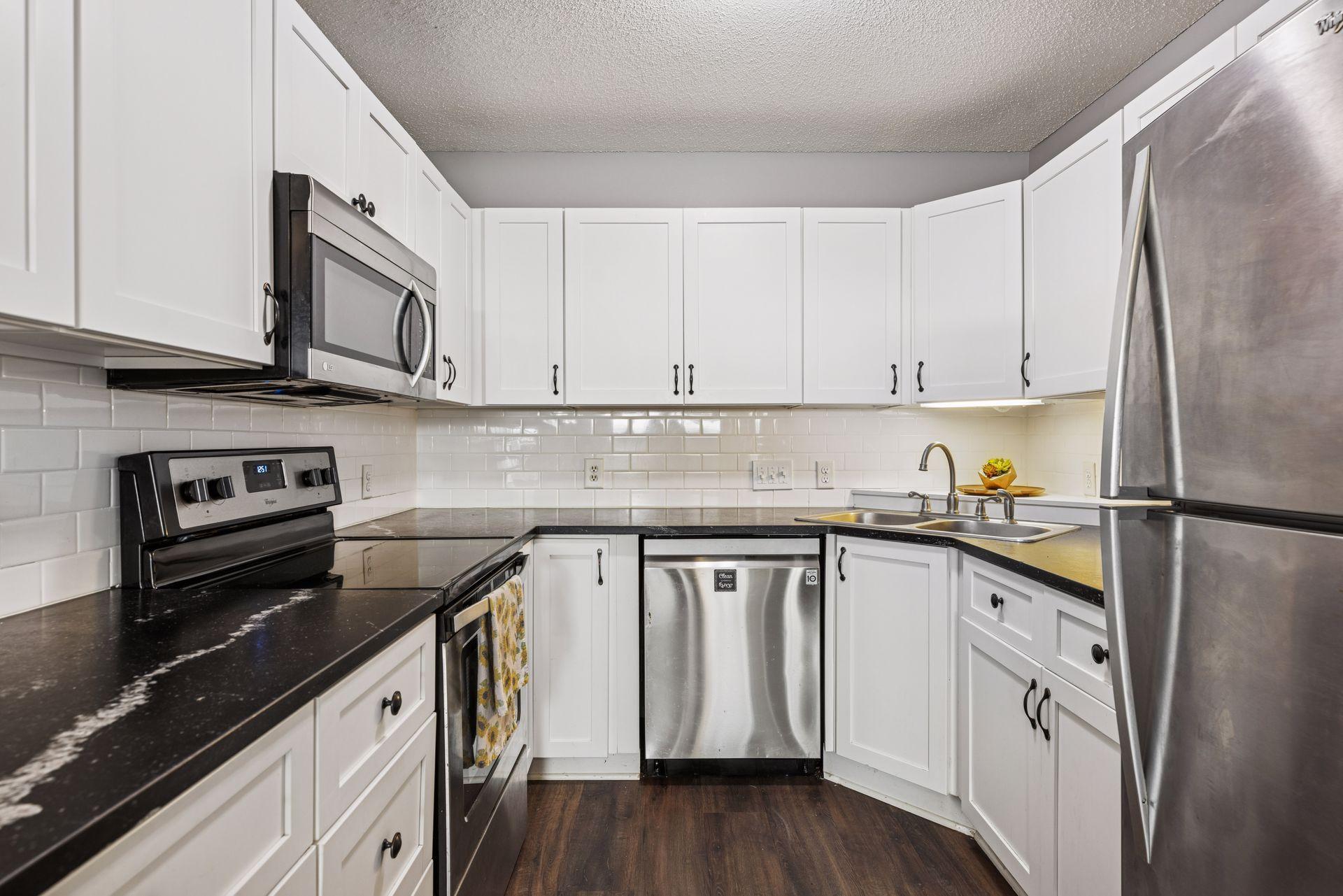 Ample storage and generous counter space make meal preparation both practical and enjoyable.