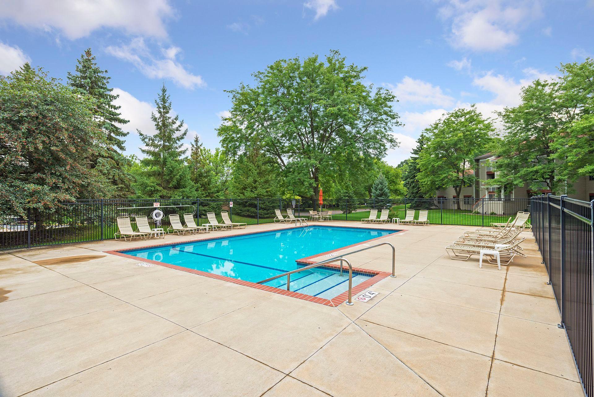 Residents of Twin Fountains enjoy access to a fantastic outdoor swimming pool, offering a resort-like amenity just steps from home. The association fee includes cable television and internet, adding exceptional value and simplifying monthly expenses.