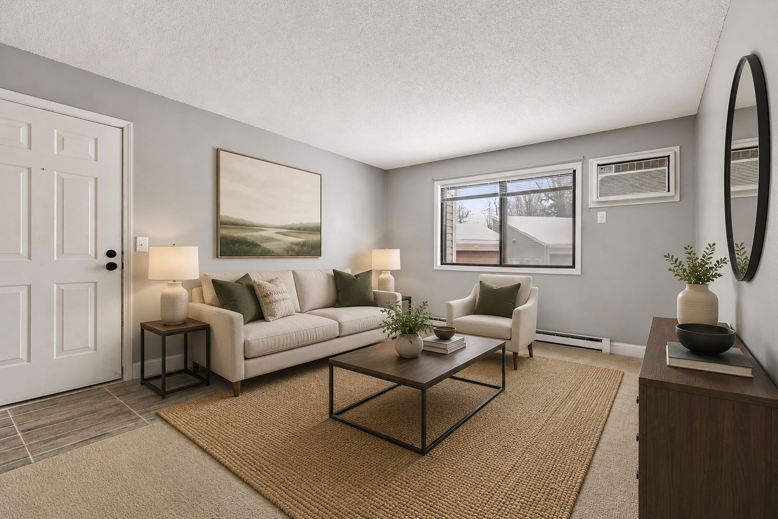 Virtually Staged Living Room- The living room serves as a warm and inviting centerpiece of the home. Large windows allow natural light to fill the space, enhancing the open feel, while the fireplace adds a cozy focal point.