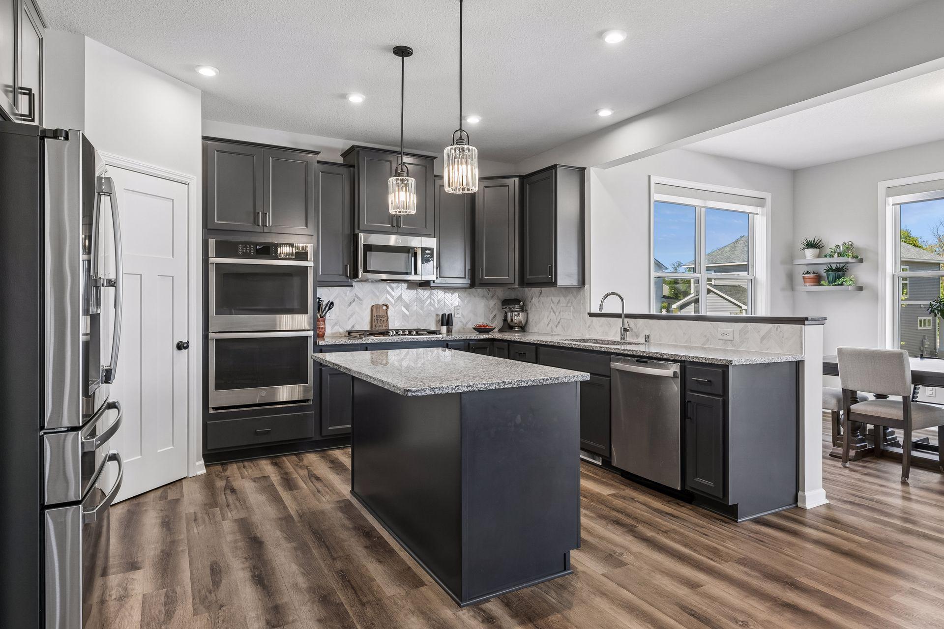 Gorgeous kitchen opens to morning/sun room