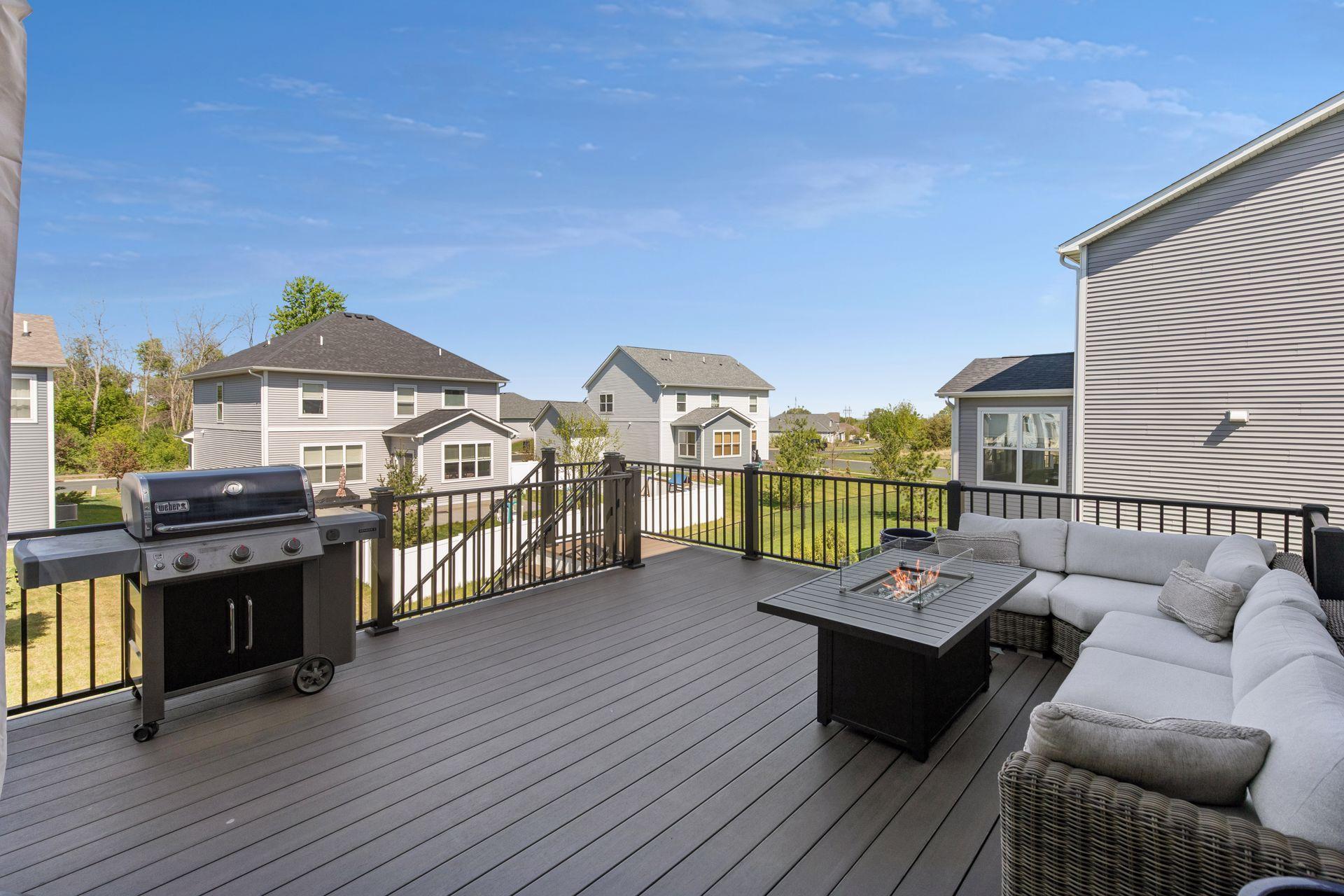 Maintenance free custom deck with stairs to back yard