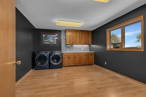 Large laundry room that can double as an office