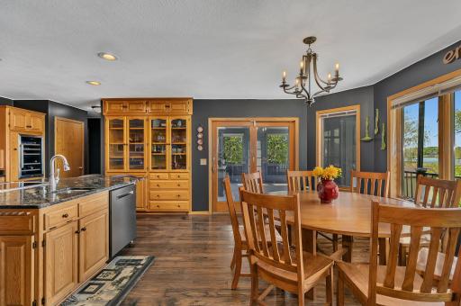 Spacious, executive kitchen and informal dining overlooking the lake