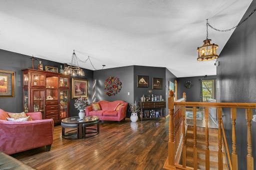 As you enter you are welcomed by the luxurious, front sitting room that could also be used as a formal dining area