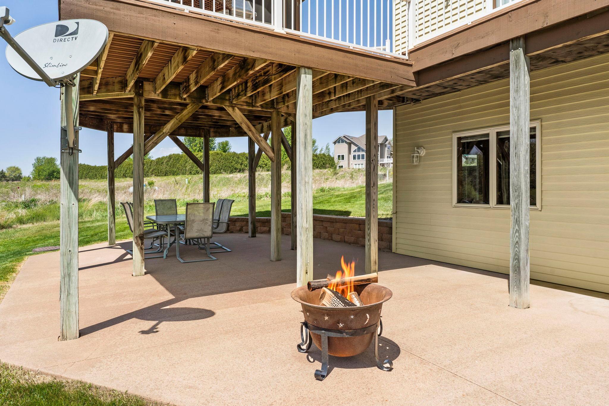 A walkout patio extends the lower level.