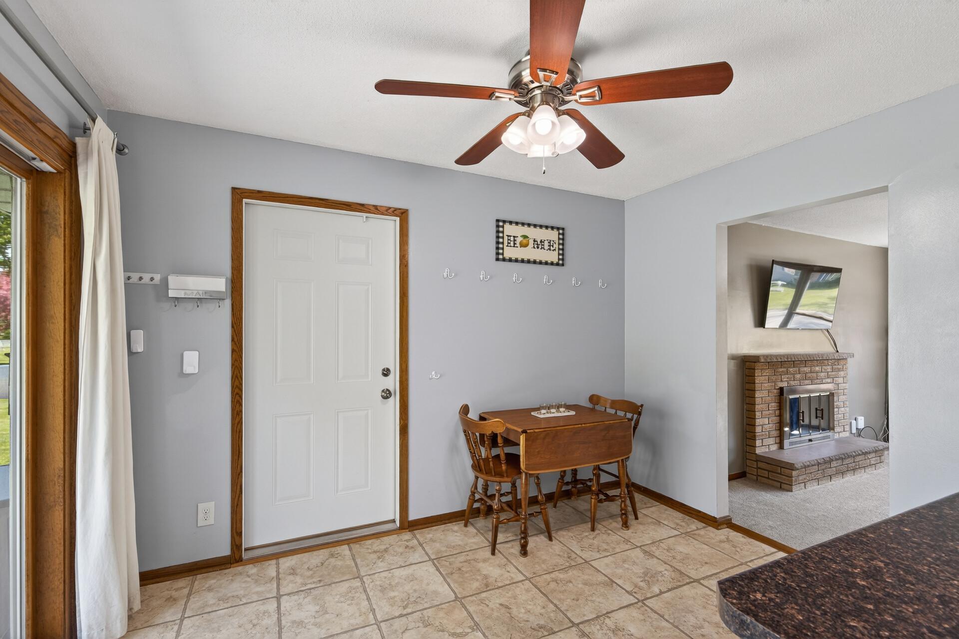 Informal dining space with a ceiling fan