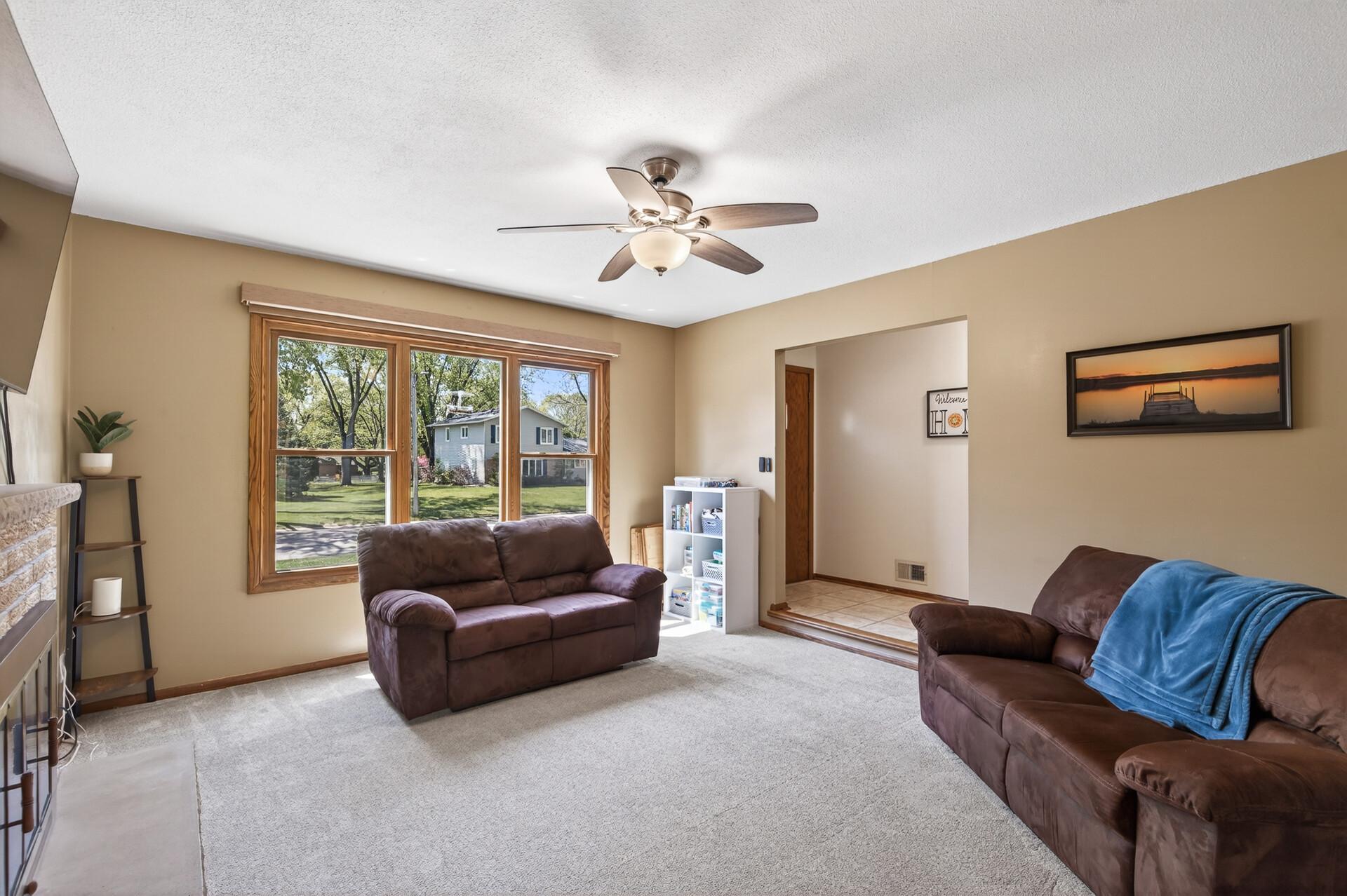Large picture window fills the room with natural light