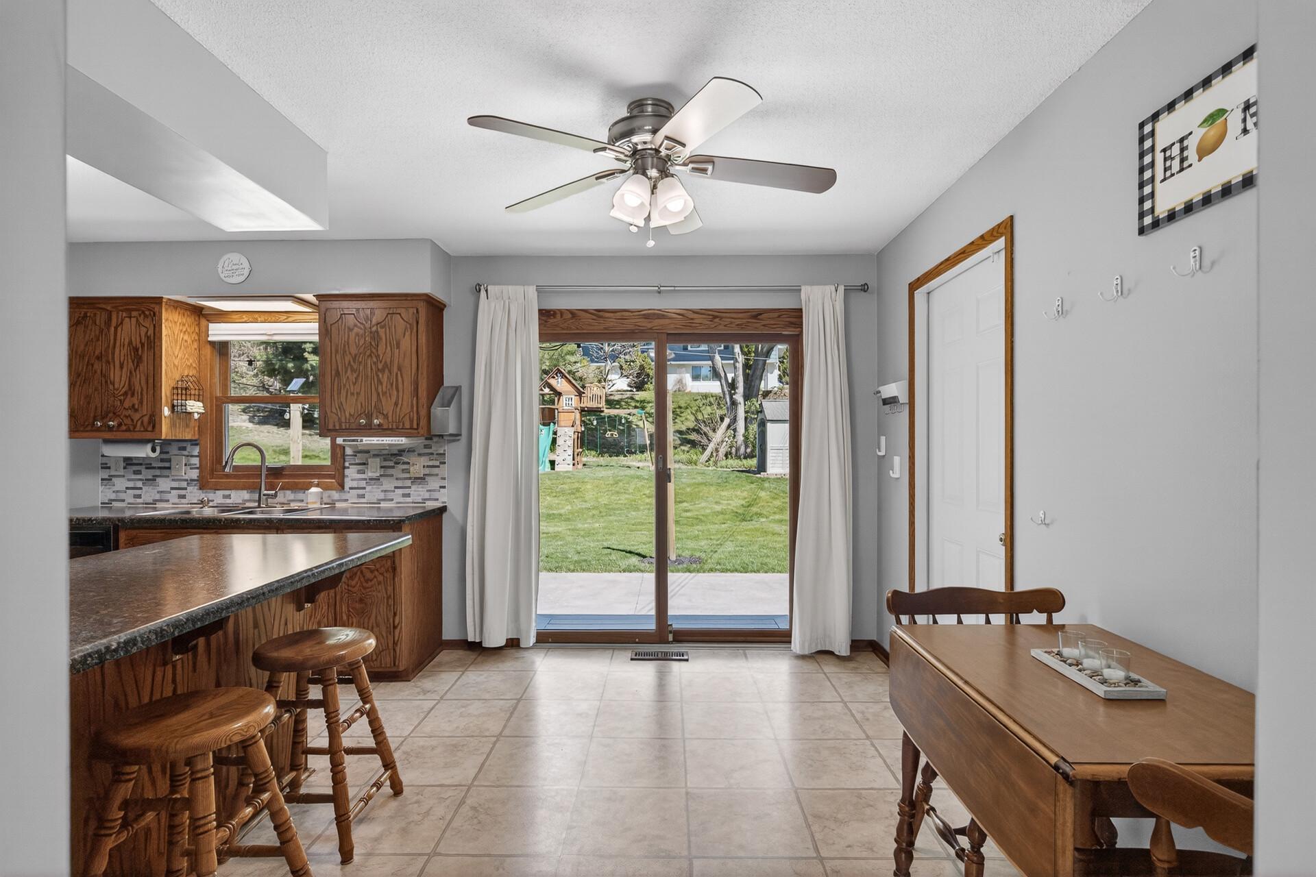 Functional eat-in kitchen with patio access