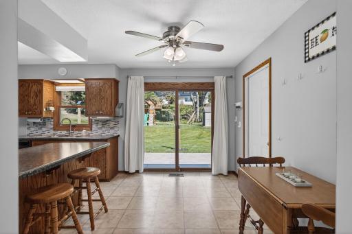 Functional eat-in kitchen with patio access